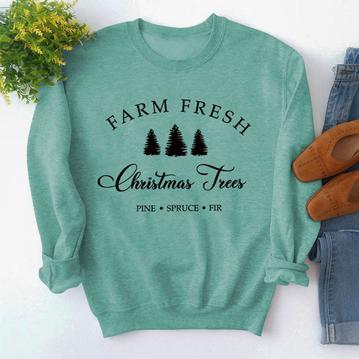 Light green sweater (black font) / S