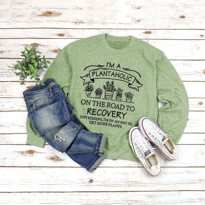 Olive green sweater (black font) / S