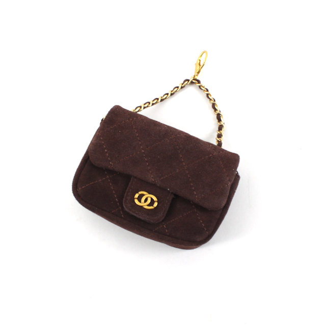 Coffee brown genuine suede mini quilted handbag charm with gold-tone chain and flap closure.