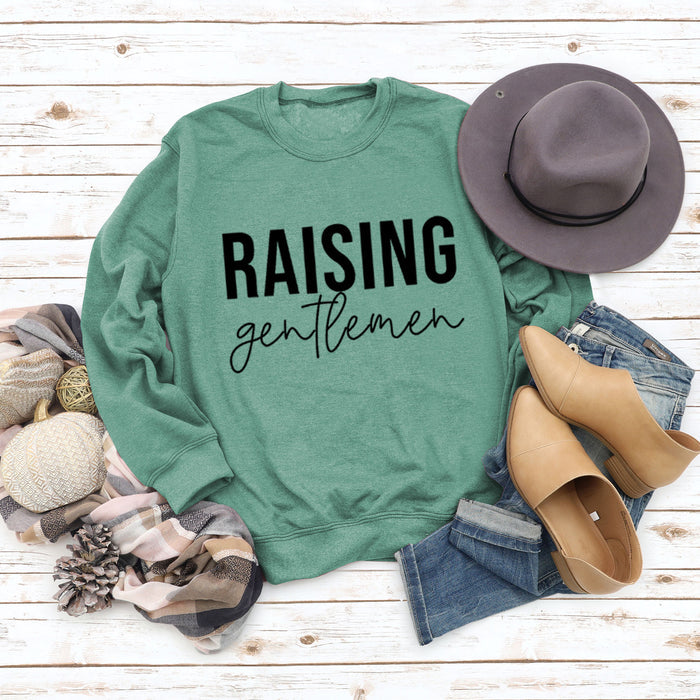 Light green sweater (black font) / S