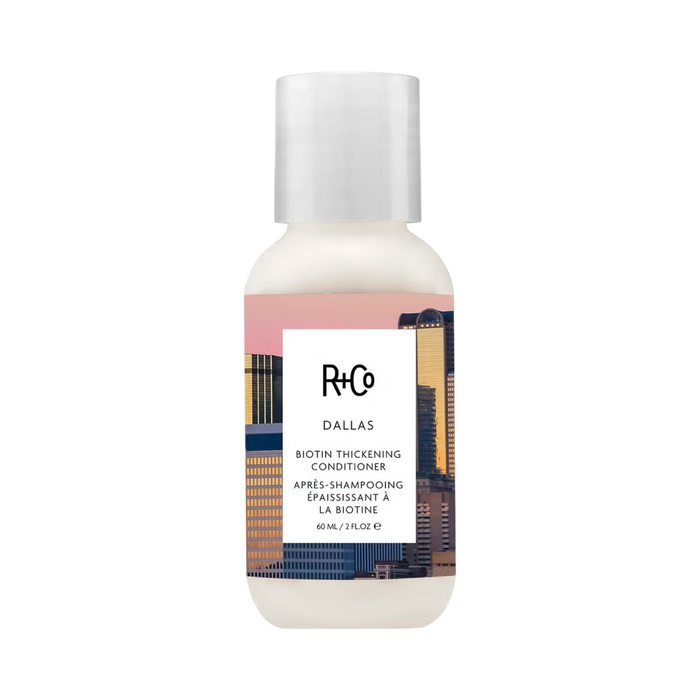 R+Co Dallas Biotin Thickening Conditioner bottle on a white background