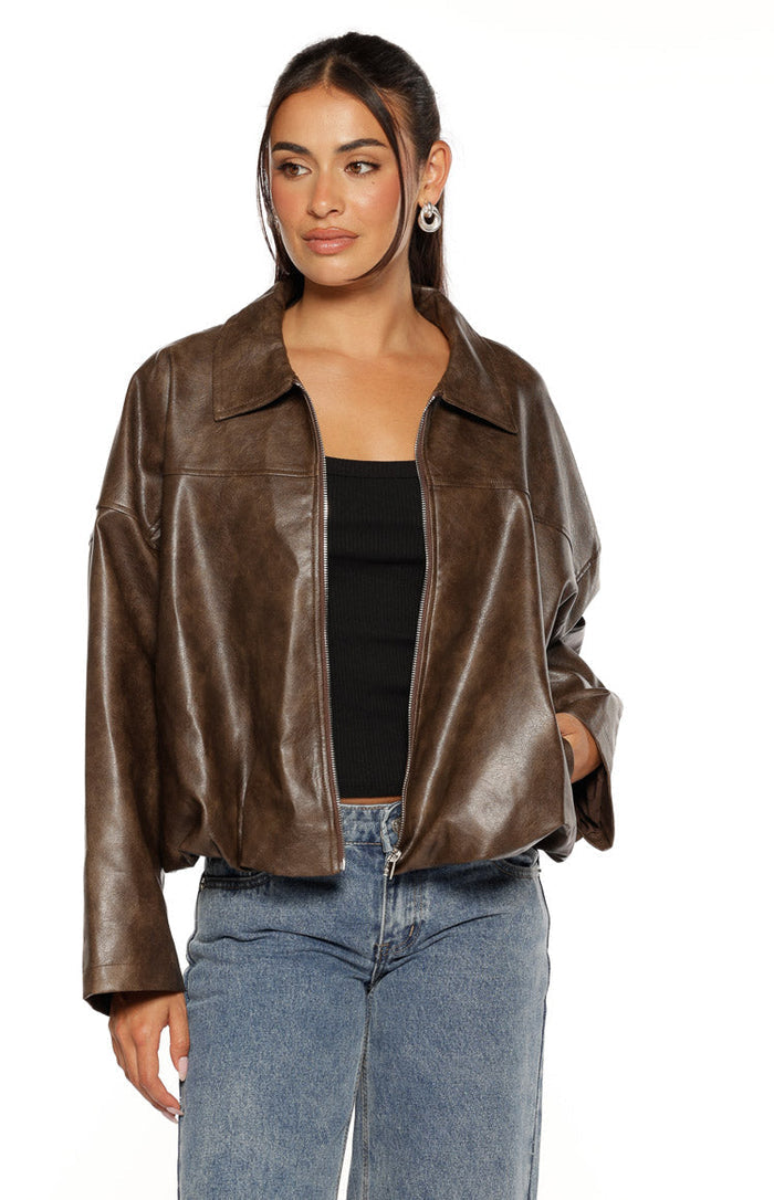 Front view of a brown PU bomber jacket, open to show the full zip and side pocket detail, with a bubble hem