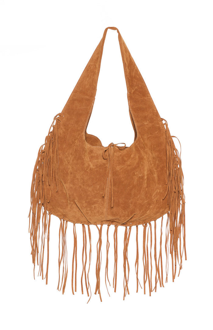 Tan suedette shoulder bag with a wide strap, drawstring top, and long fringe along the bottom