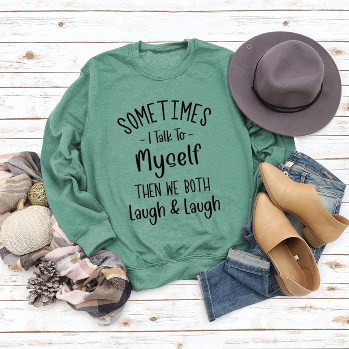 Light green sweater (black font) / S