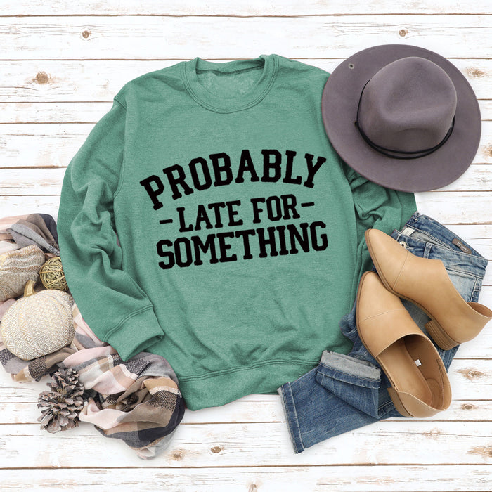 Light green sweater (black font) / S