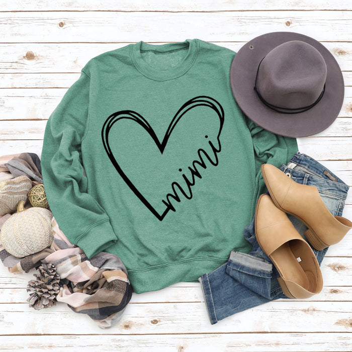 Light green sweater (black font) / S