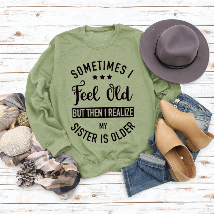 Olive sweater (black font) / S