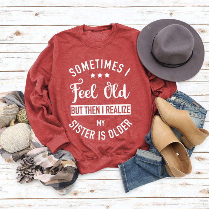 Red sweater (white font) / S