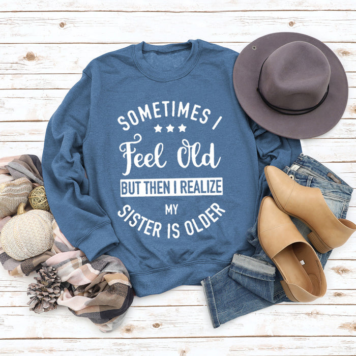 Blue sweater (white font) / S