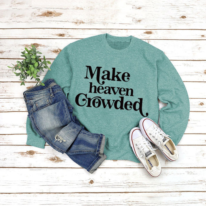 Light green sweater (black font) / S