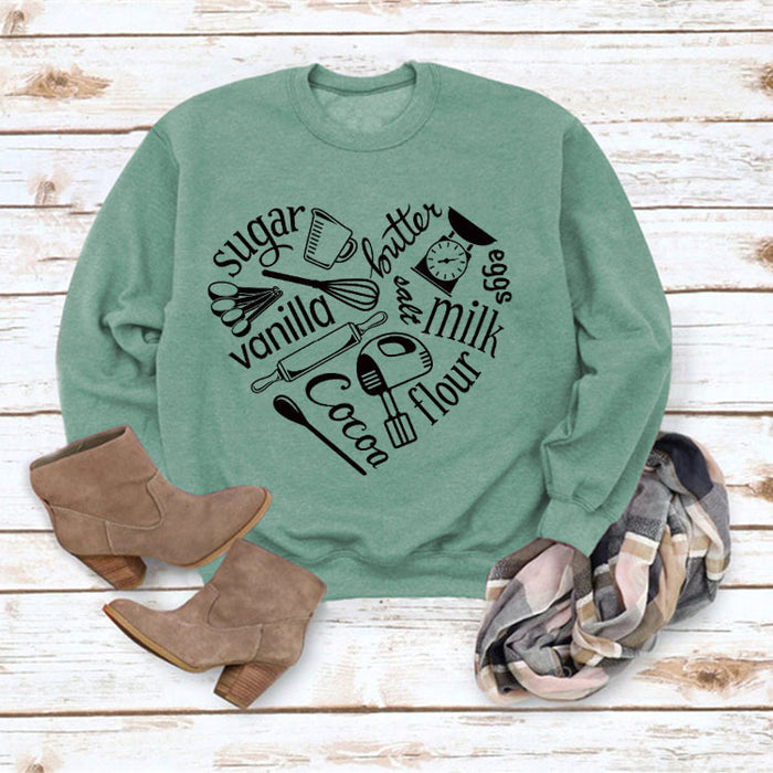 Light green sweater (black font) / S