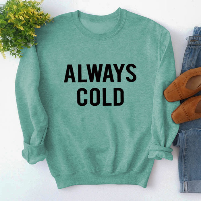 Light green sweater (black font) / S