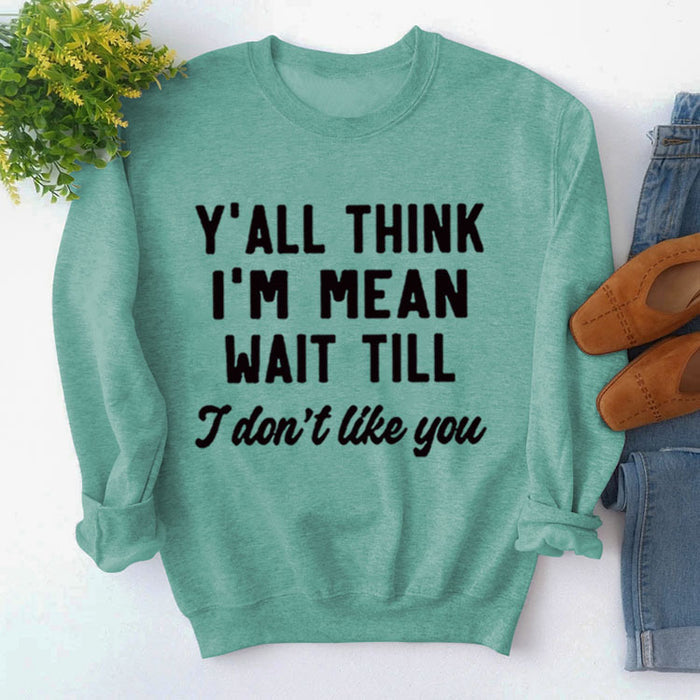 Light green sweater (black font) / S