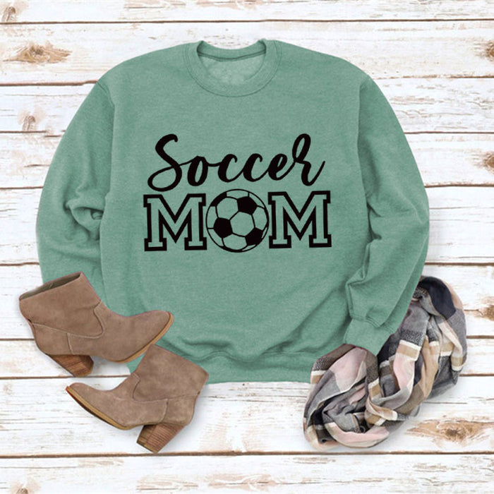 Light green sweater (black font) / S