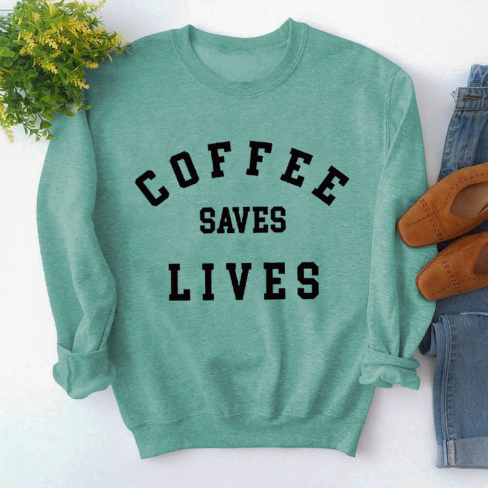 Light green sweater (black font) / S