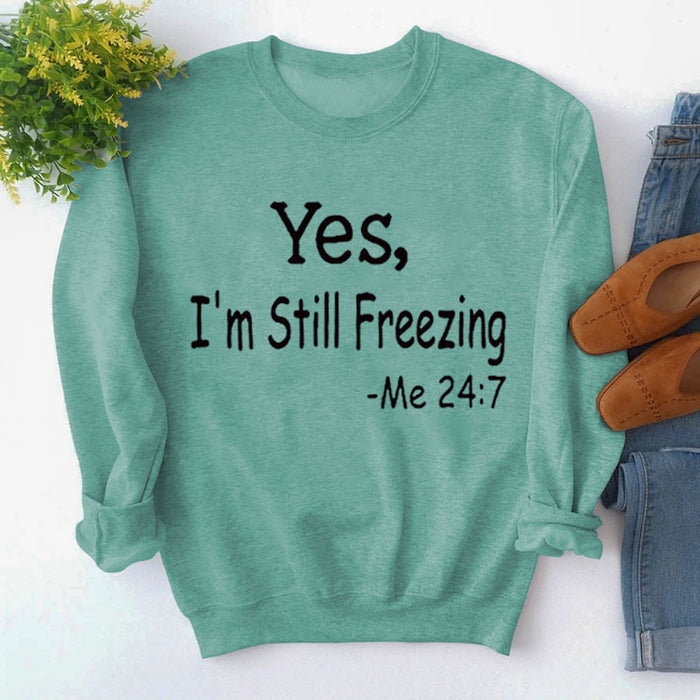 Light green sweater (black font) / S