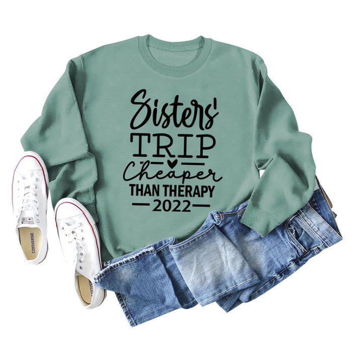Light green sweater (black font) / S