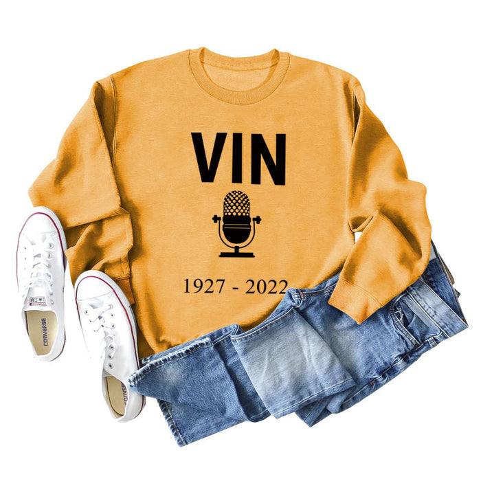 Yellow sweater (black font) / S
