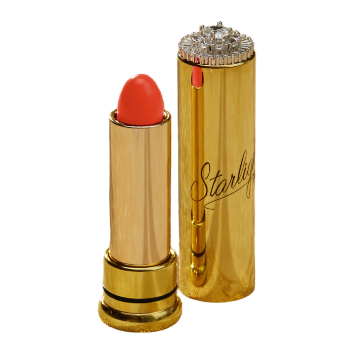 Starlight Vintage Cosmetics Holly’s Peach lipstick in warm peachy-pink shade with vintage-inspired gold metal tube.
