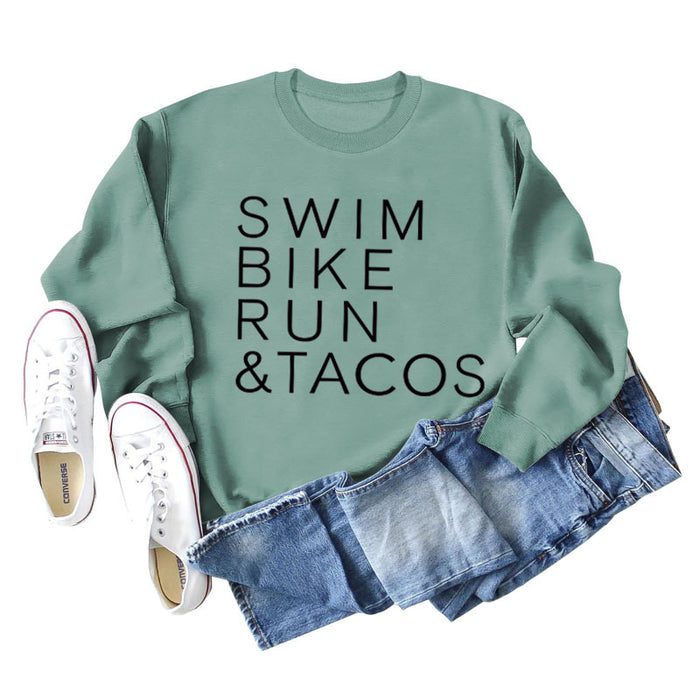 Light green sweater (black font) / S