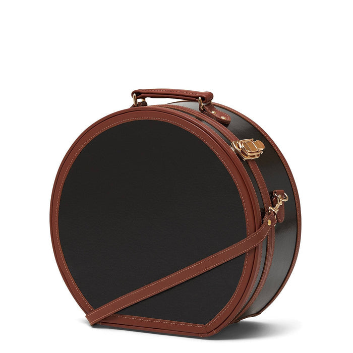 Angled product view of the large hatbox Diplomat leather suitcase in black with shoulder attachment strap