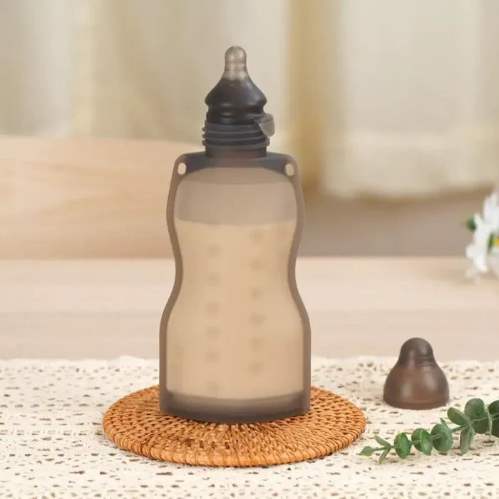 Soft gray Silicone baby bottle with nipple from Toshi Baby Romper deals, perfect for on-the-go