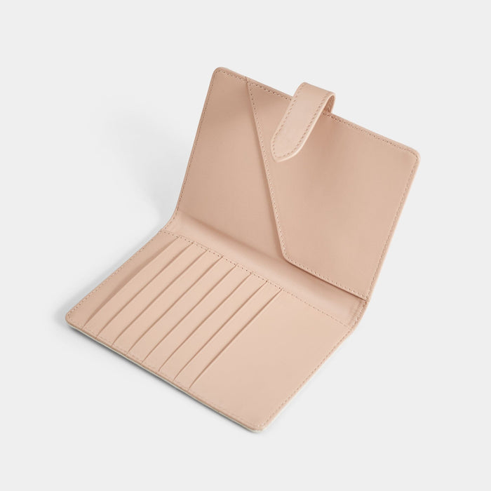 Open product view of the Navigator leather passport holder in stone with stone trim