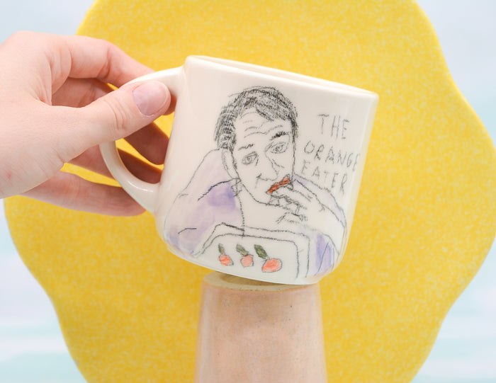 The Orange Eater Mug