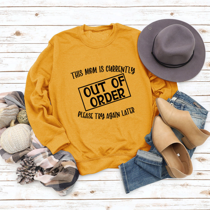 Yellow sweater (black font) / S