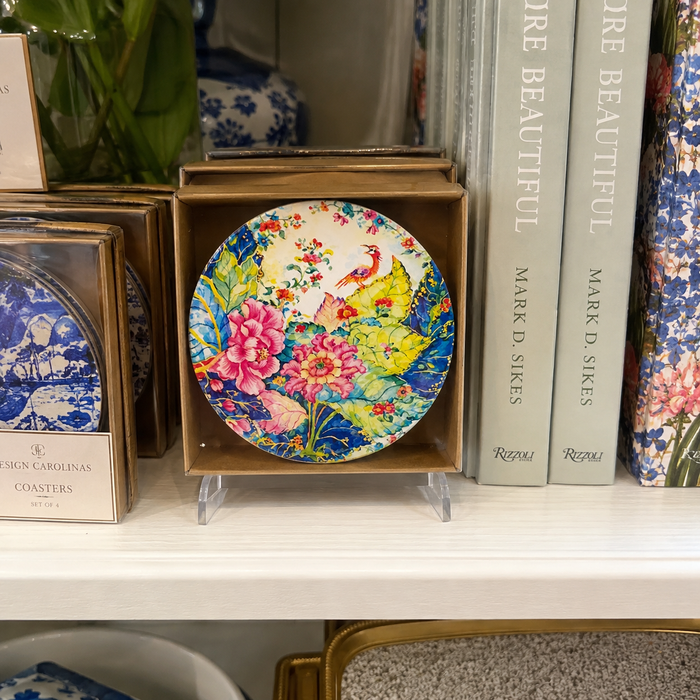 Set of two Tobacco Leaf-inspired ceramic coasters with colorful floral and bird design and natural cork backing