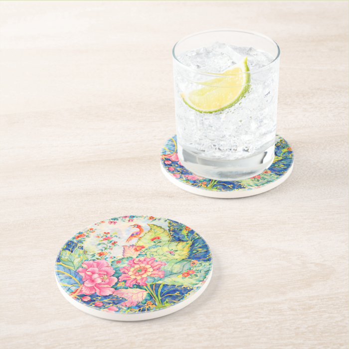 Set of two Tobacco Leaf-inspired ceramic coasters with colorful floral and bird design and natural cork backing