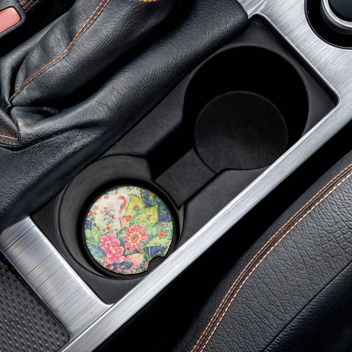 Set of two Tobacco Leaf-inspired soapstone car coasters with colorful pink flowers, green foliage and bird design