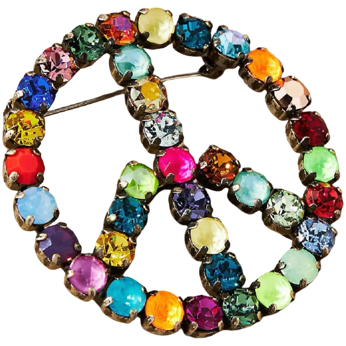 Multicolored jeweled peace sign brooch on a white background