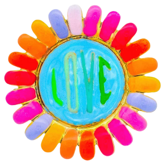 Colorful brooch with 'LOVE' text on a white background