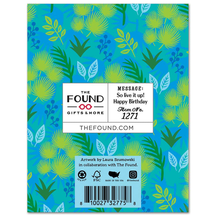 Product packaging with leaf pattern and branding information on a blue background
