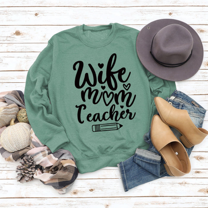 Light green sweater (black font) / S