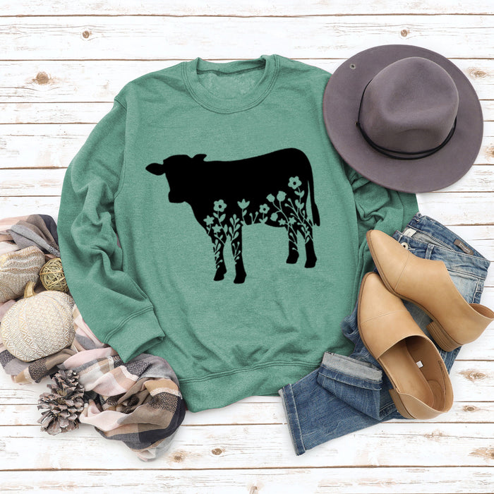 Light green sweater (black font) / S