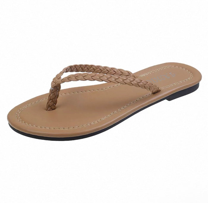 Beige sandal with braided strap on a white background