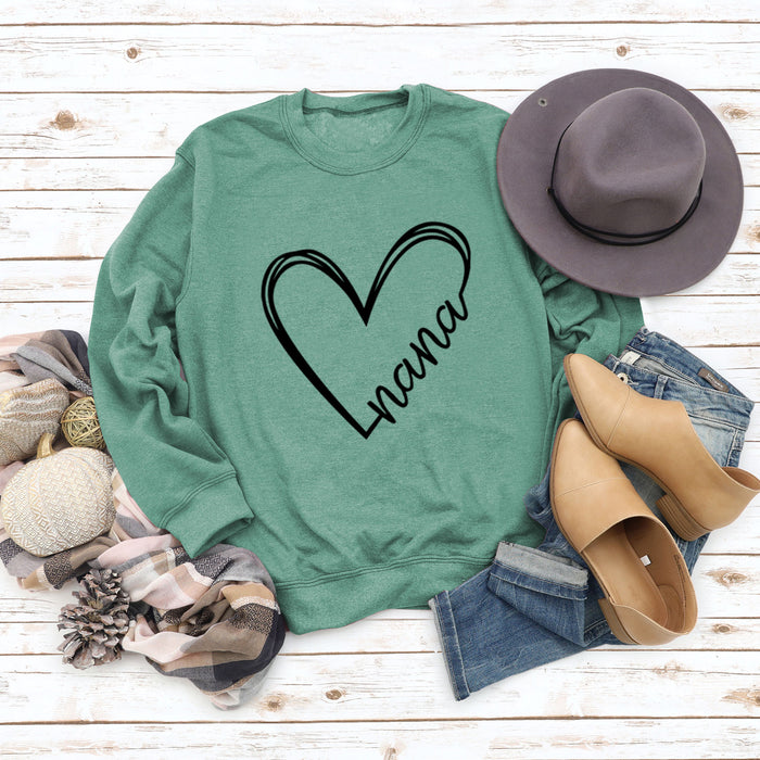 Light green sweater (black font) / S