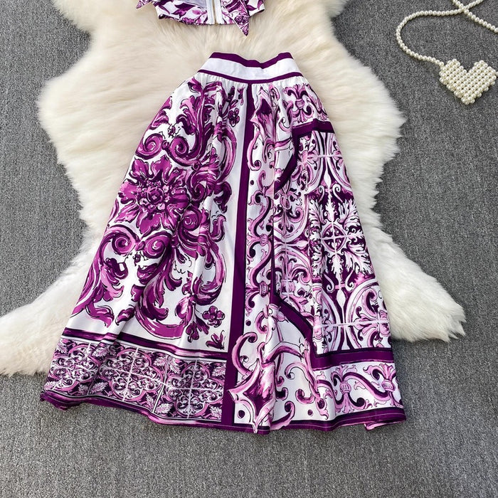 Purple and white patterned dress on a textured surface