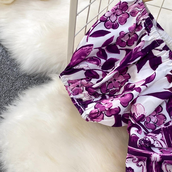Purple floral-patterned fabric on a white surface