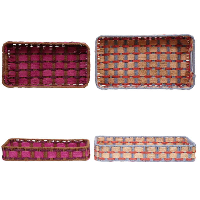 Set of four woven baskets with different color patterns on a white background