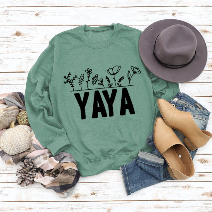 Light green sweater (black font) / S