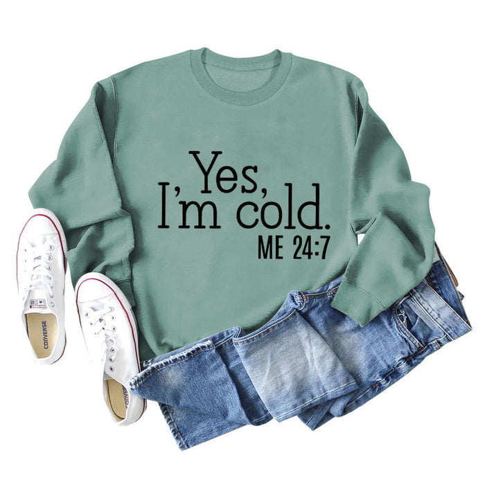Light green sweater (black font) / S