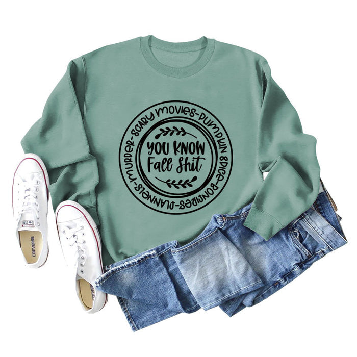 Light green sweater (black font) / S